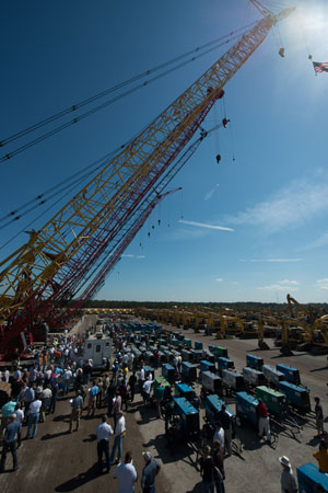 A crowd of bidders gather in the yard at Ritchie Bros. six-day, record-breaking auction in Orlando, FL.
