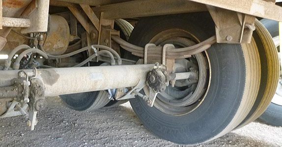 Inspecting leaf spring suspension on a trailer