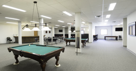 The bar/lounge area with pool tables