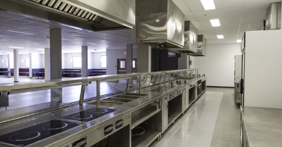 The fully-equipped, professional-grade kitchen in the work camp for sale at Ritchie Bros.