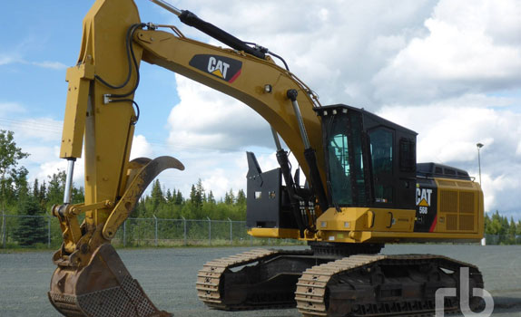 2014 Caterpillar 568 Roadbuilder hydraulic excavator auctioned in Prince George, BC.