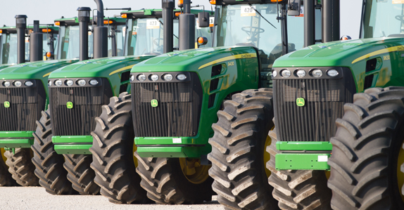 John Deere tractors lined up at a Ritchie Bros. auction in Chicago