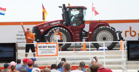 Ritchie Bros. auctioneers in Chicago selling farming equipment