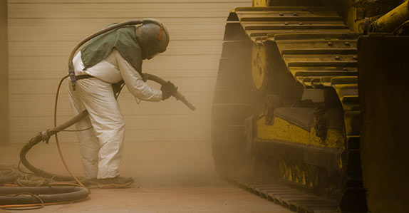 Refurbishing heavy equipment for sale at Ritchie Bros.