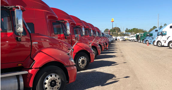 red truck tractors ready to sell at Ritchie Bros. Orlando 2018 auction red truck tractors ready to sell at Ritchie Bros. Orlando 2018 auction