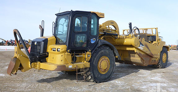 2012 Caterpillar 627H motor scraper sold at Ritchie Bros. equipment auction 2012 Caterpillar 627H motor scraper sold at Ritchie Bros. equipment auction