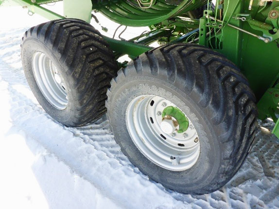Undercarriage of a used bailer sold by Ritchie Bros. Undercarriage of a used bailer sold by Ritchie Bros.