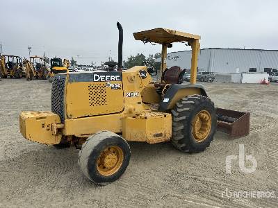 Photo of a 2007 John Deere 210LE